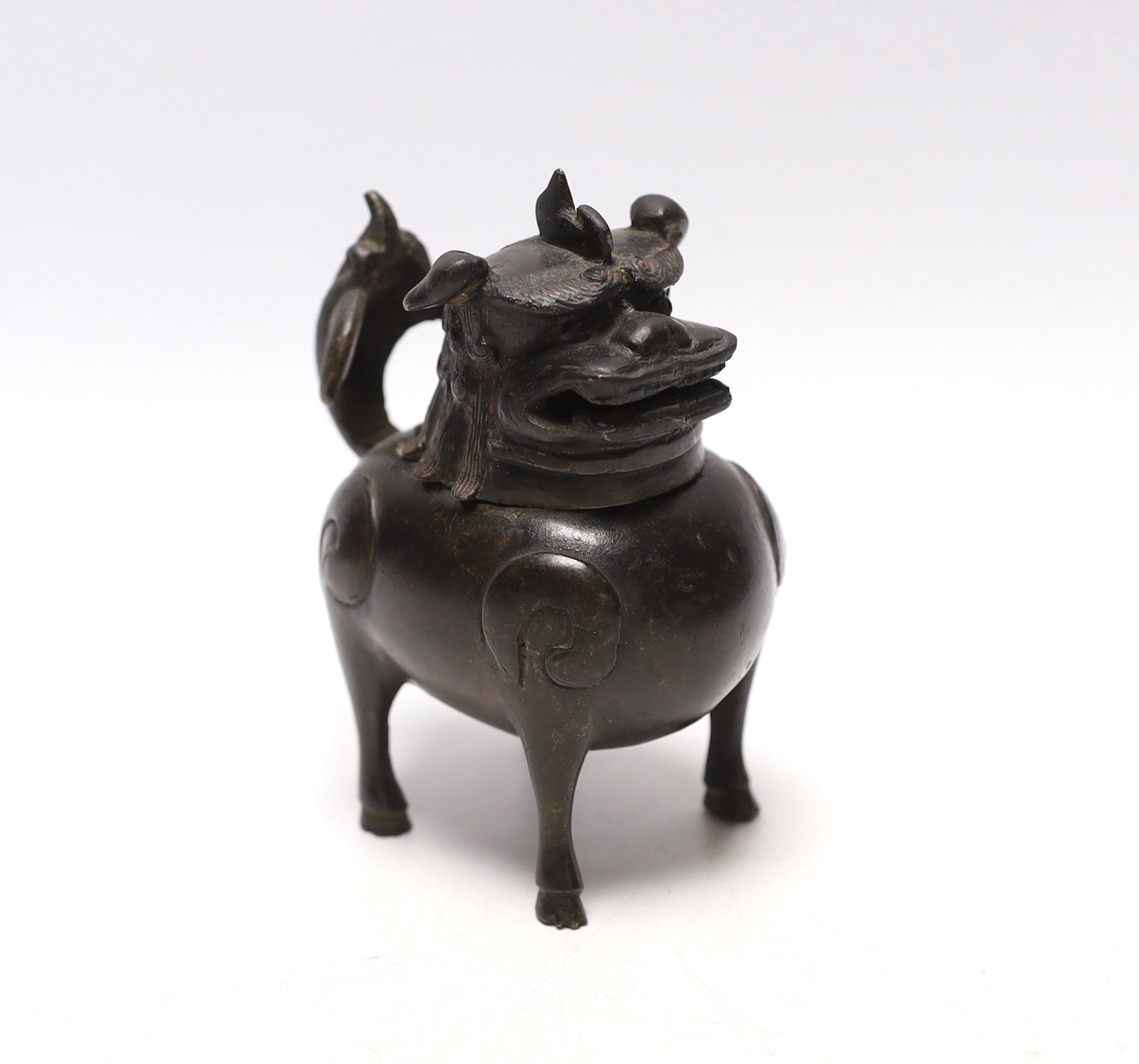 A Chinese bronze mythical beast censer and cover (Luduan), 17th century, the cover with pierced mouth, 9cm in length